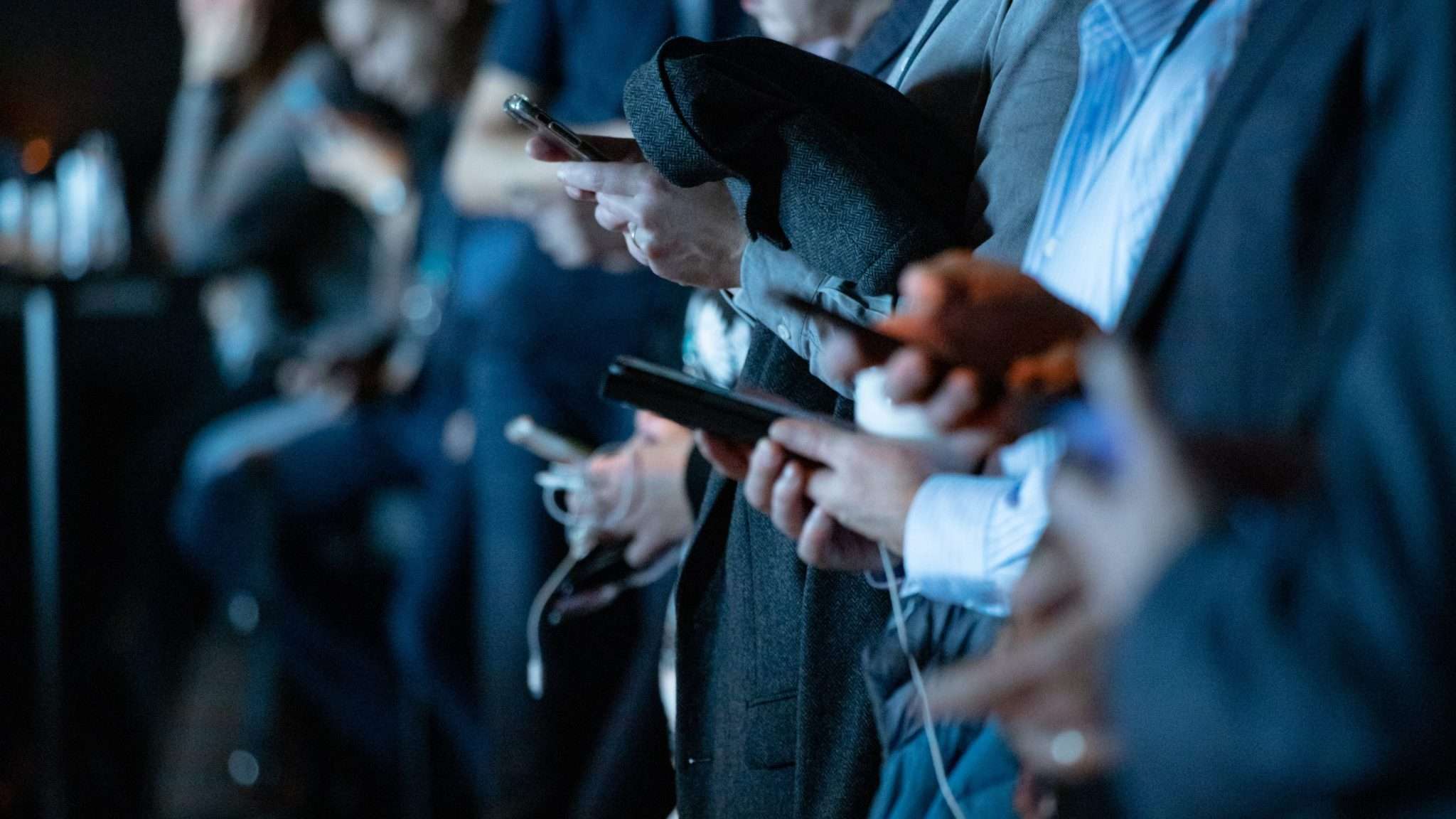people on their phones
