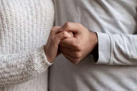 Close Up Couple Holding Hands