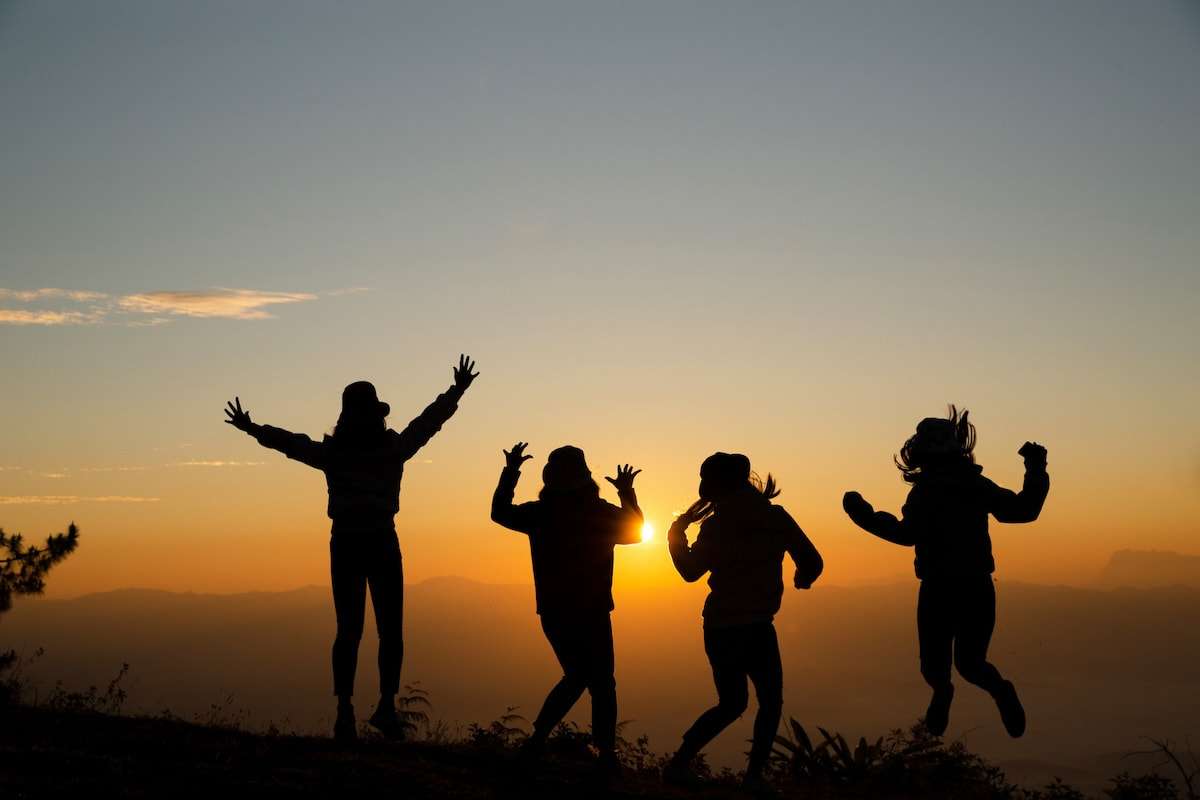 Group happy outdoors celebrate joy