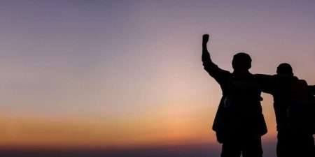 Silhouette of Cheering Couple