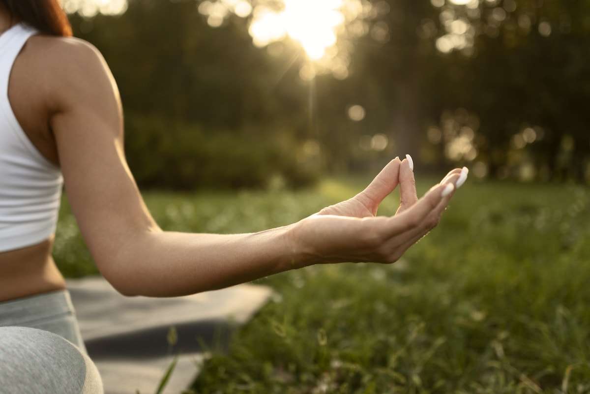 Woman Meditating in Nature