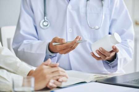 Doctor recommending medication to patient