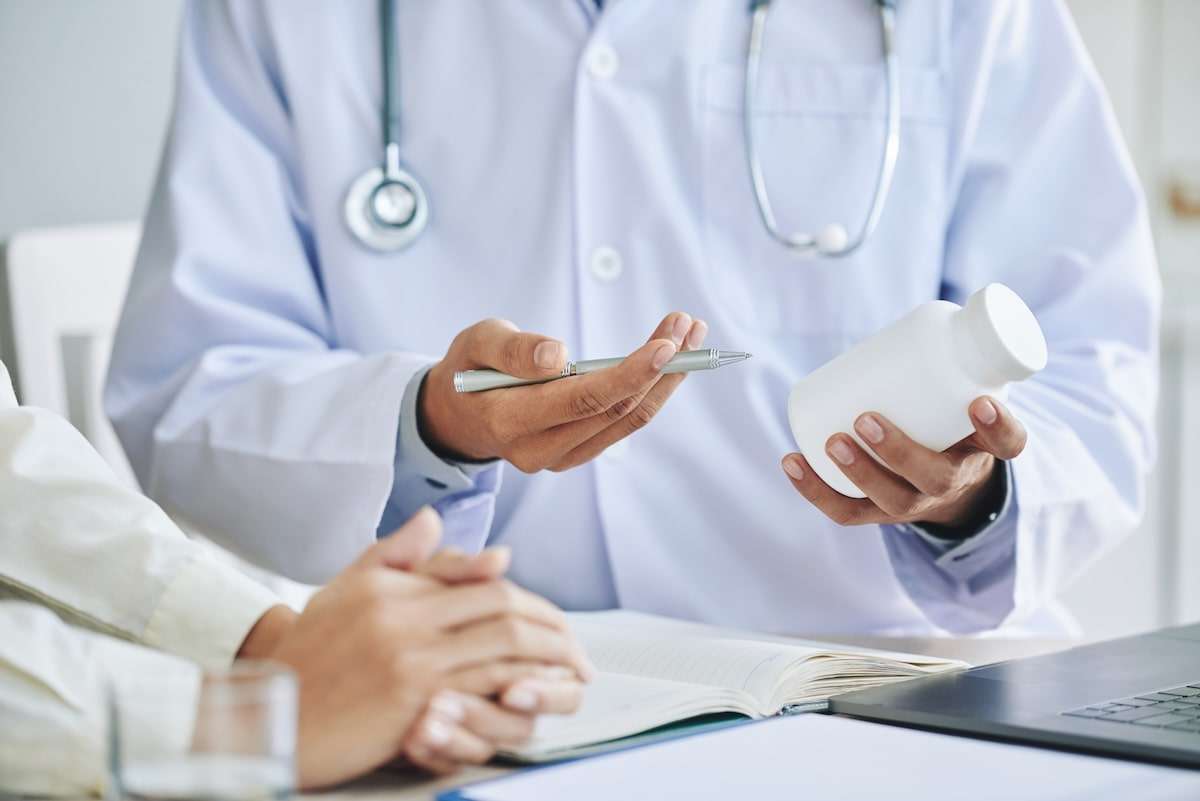 Doctor recommending medication to patient