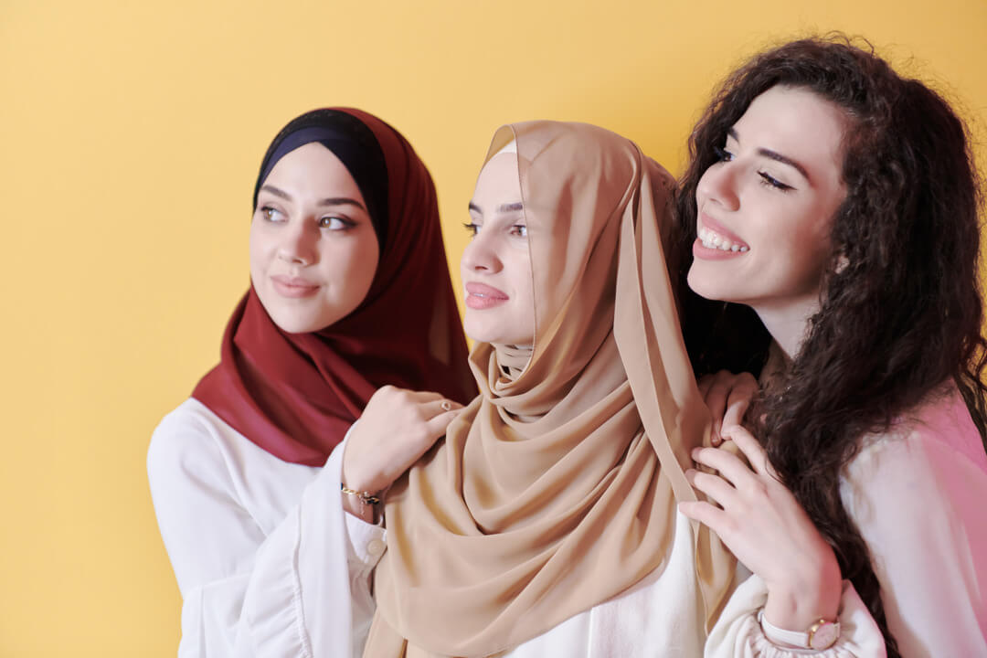Supportive Muslim women embracing recovery together in a safe, faith-based environment near Edinburgh